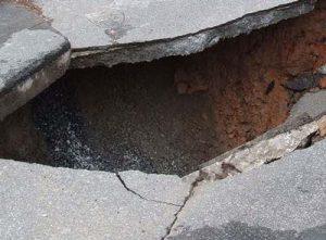 Sinkhole in Concrete Road